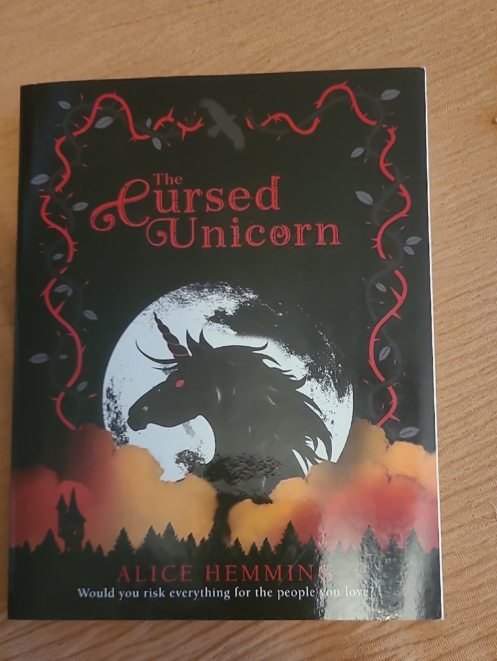 The Cursed Unicorn Hardcover - Black with Red Vine Artwork